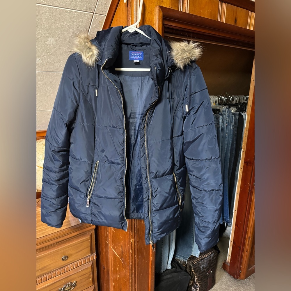 Woman’s Simply Styled Coat